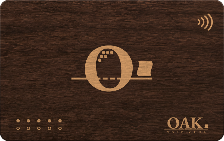 The OAK Card: a walnut key card laser-engraved with the Dimple O, the OAK. wordmark and a tap symbol